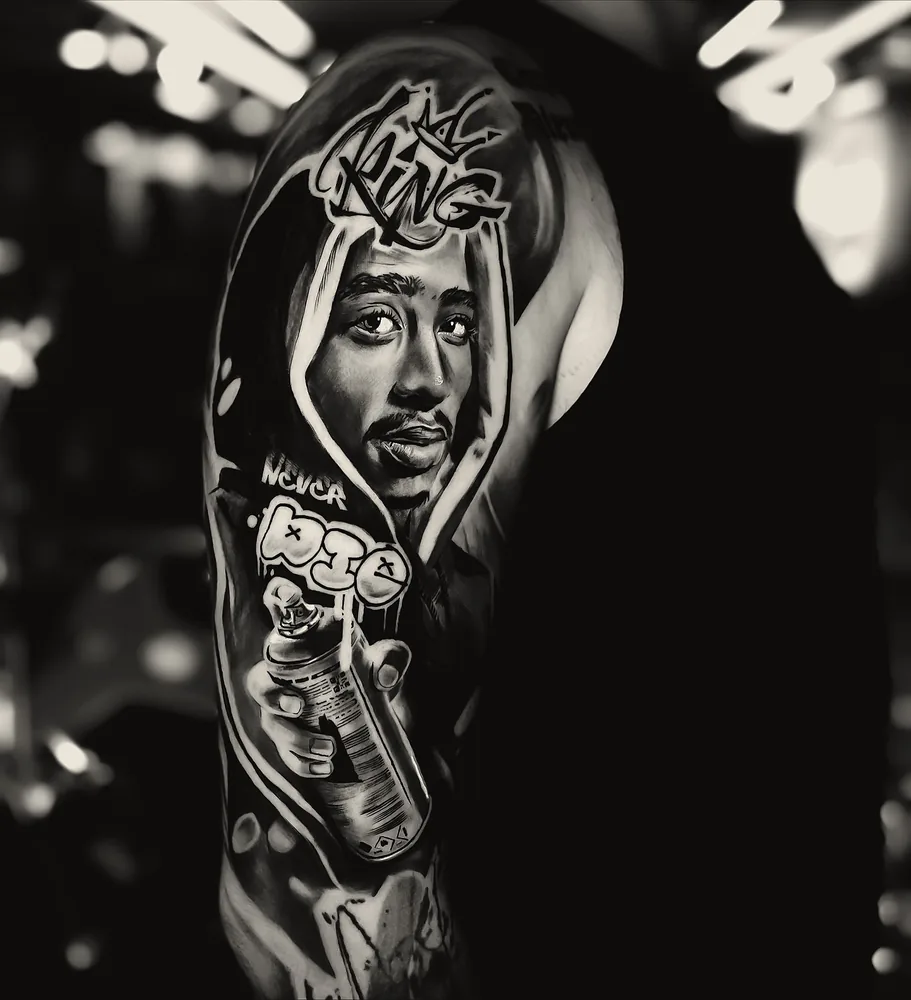 Tupac tattoo — shoulder and sleeve, black and grey realism (2)