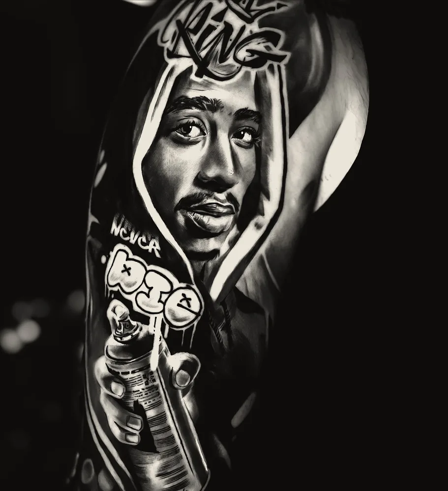 Tupac tattoo — shoulder and sleeve, black and grey realism (3)